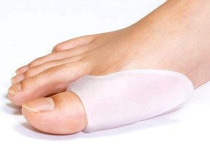 A gel bunion shield that goes around big toe to reduce friction