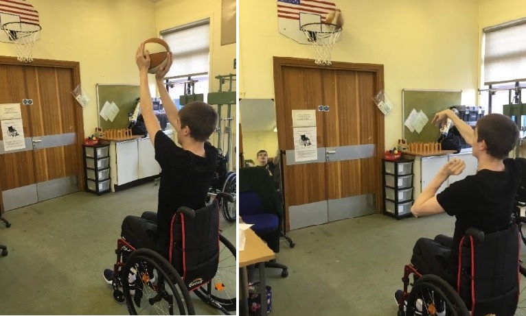 Someone in a wheelchair shooting baskets