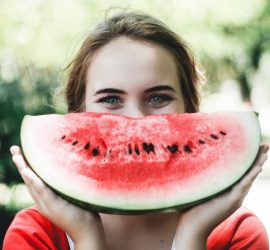 Young person with watermelon